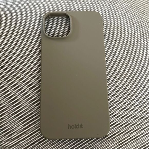 Holding soft IPhone 13 Pro silicone case - Picture 1 of 1